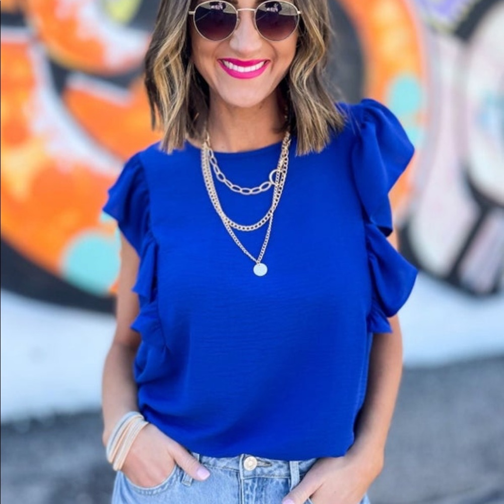 Blue ruffle top